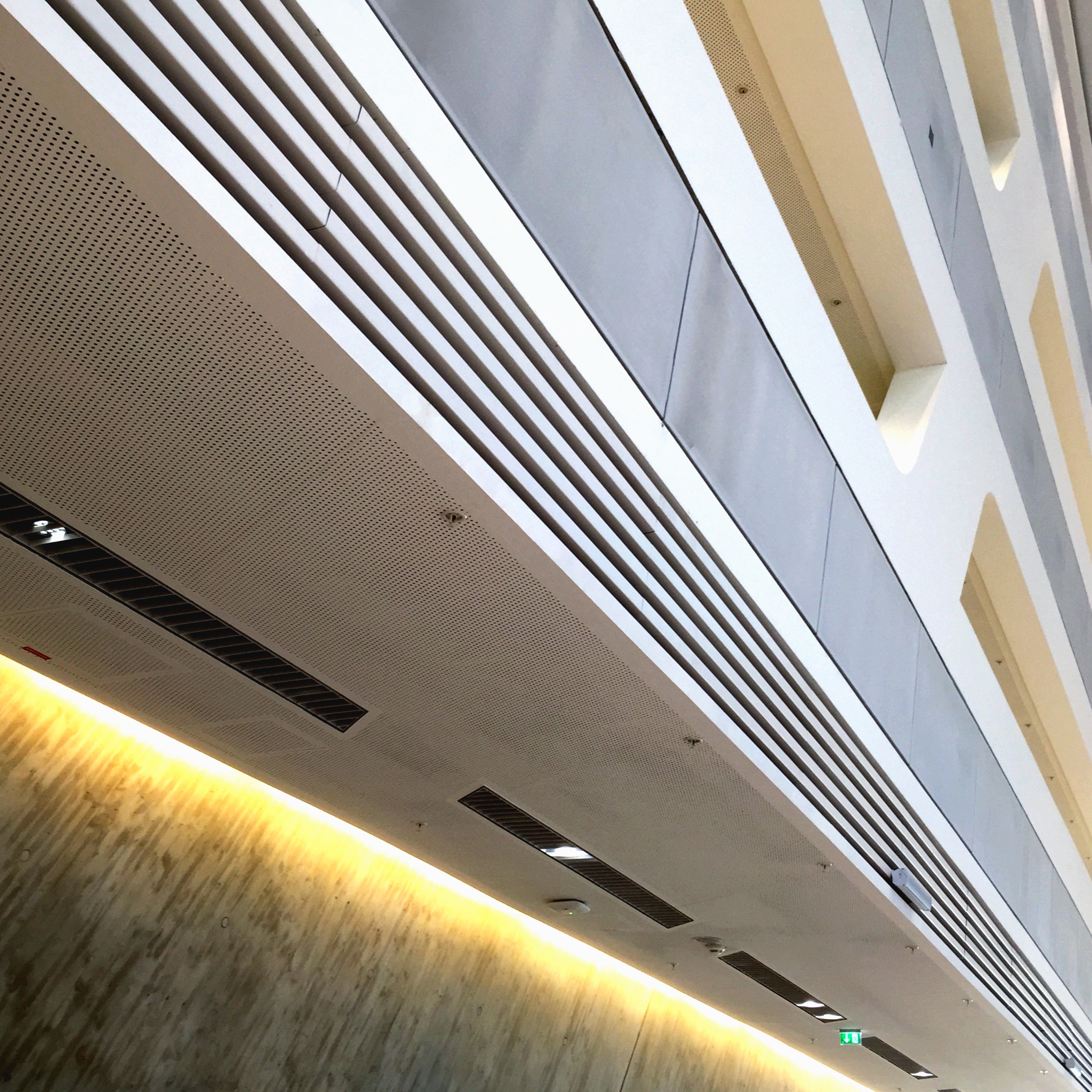 Retail ceiling ventilation grille installation by Vented Engineering Services.